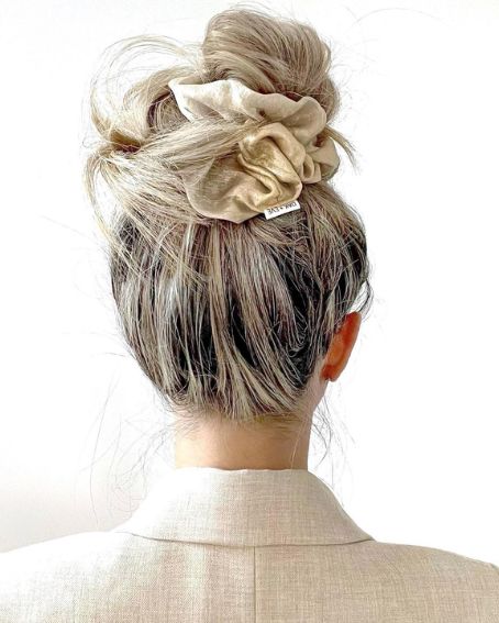 Top bun/knot hairstyle For Women Over 50