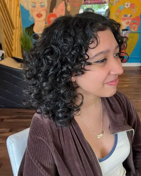 Messy Curls hairstyle For Women Over 50