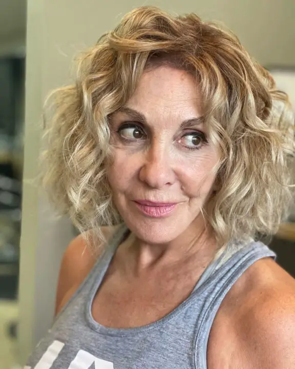 Messy curly voluminous bobs haircut For Women Over 50
