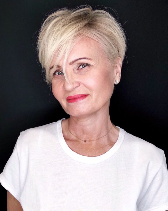 Youthful look with bright blonde hairstyle For Women Over 50