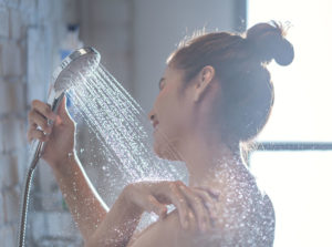 How To Take a Shower Without Getting Your Hair Wet