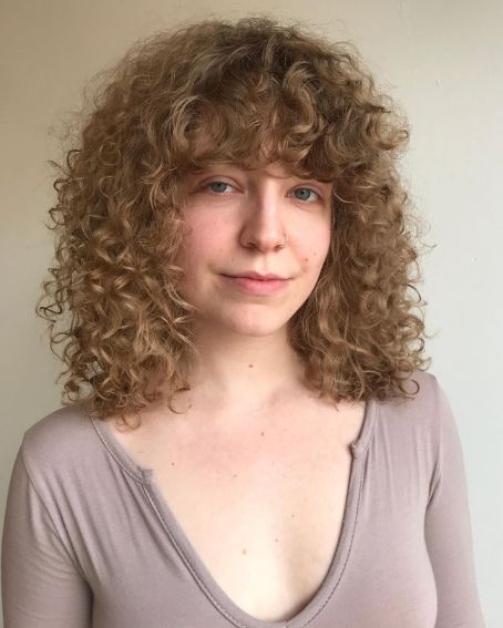Curly Bob With Bangs Haircut to Hide Sagging Jowls