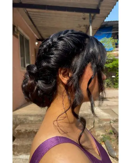 Low Bun With Side Bangs