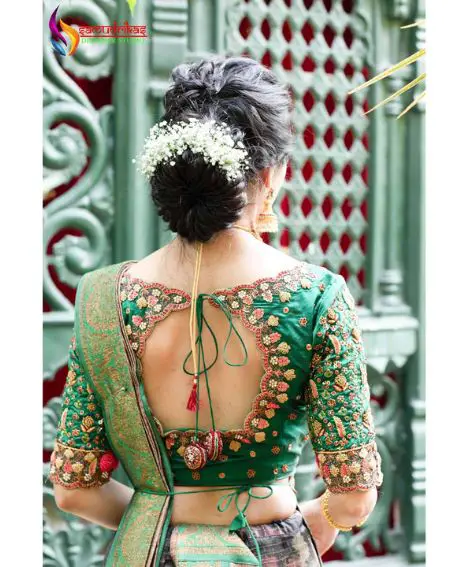 Round Cut Open Back Neck Design On Green Pattu Blouse