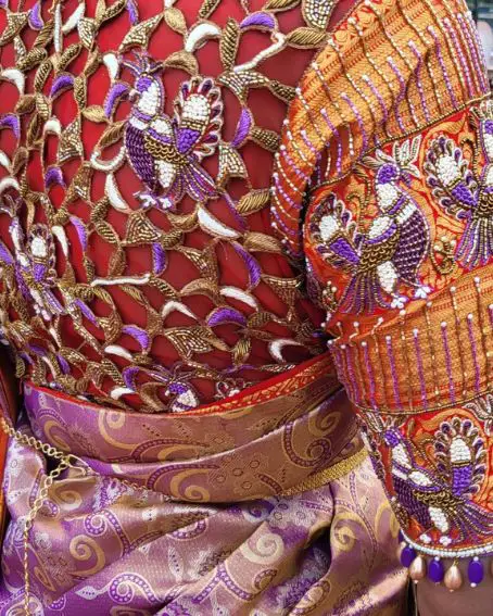 Gold, Purple And White Aari Work On Red Blouse