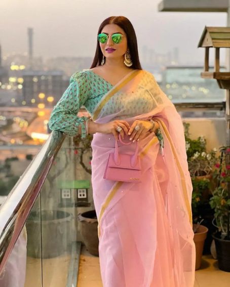 Transparent Pink Saree With Green Blouse Design