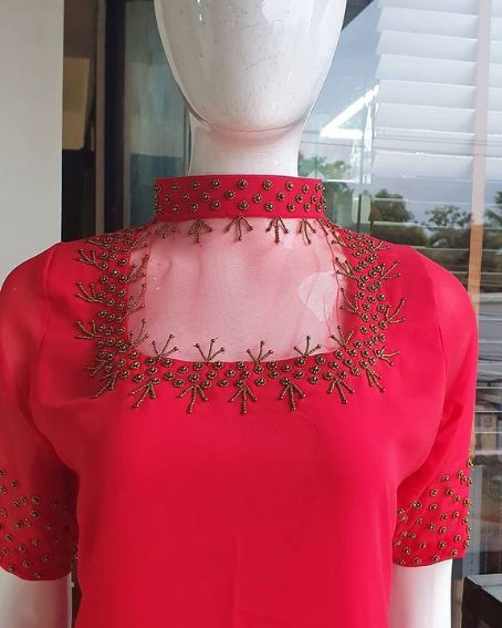 A Square-Cut, Transparent Netted Red Kurti with Embroidered Work
