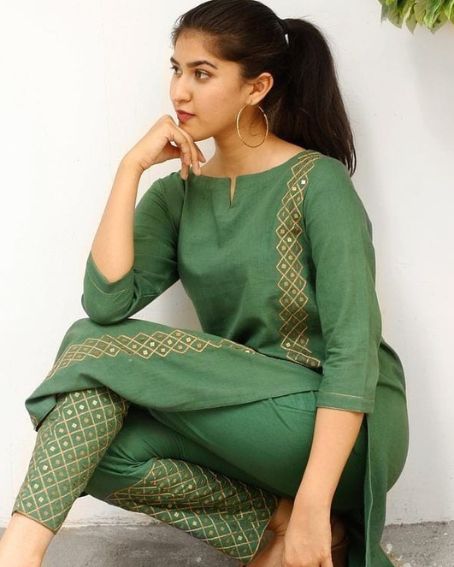 Astonishing Green Kurti with Boat Neck Design with an Open Slit