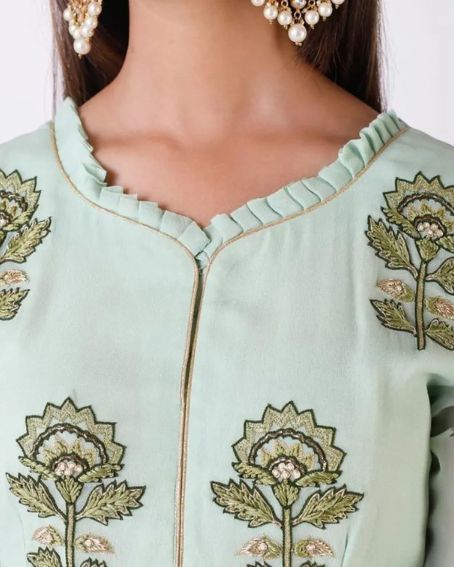 Awesome Kurti with Golden Piping Along with Frills