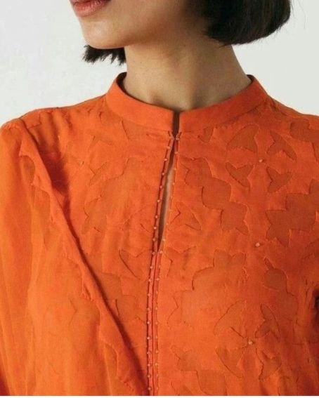Orange Clour Kuri with Mandarin Collar Neck Design with a Slit Cut Open