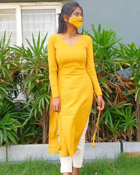 Plain Yellow Full Sleeves Kurti with a Cigarette Pant