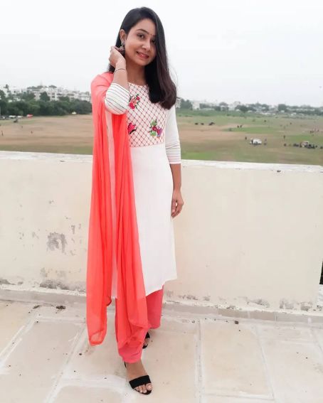 White in Red Hand Embroidery Kurti