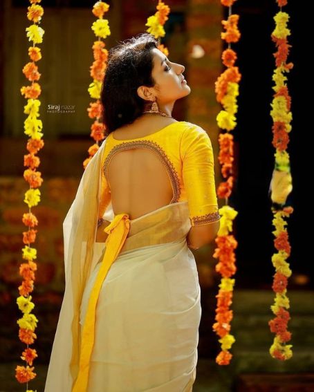 Yellow Color Full Sleeve Back Open Blouse Design