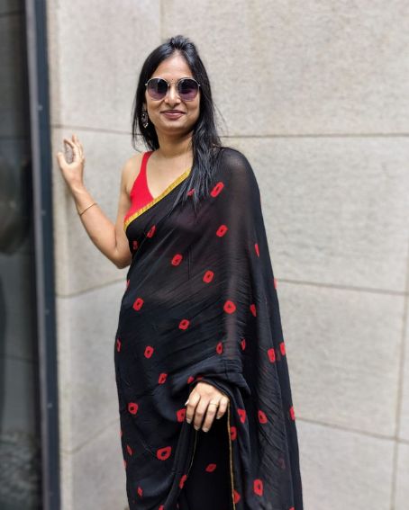 Black Chiffon Blouse with Red Sleeveless Blouse