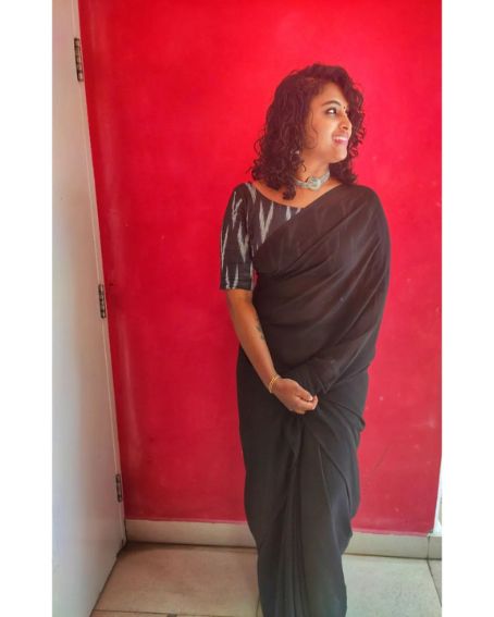 Black Plain Saree with Ikkat Boat Blouse Design