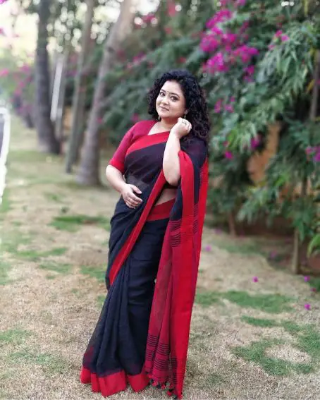 Black Saree with Maroon Blouse