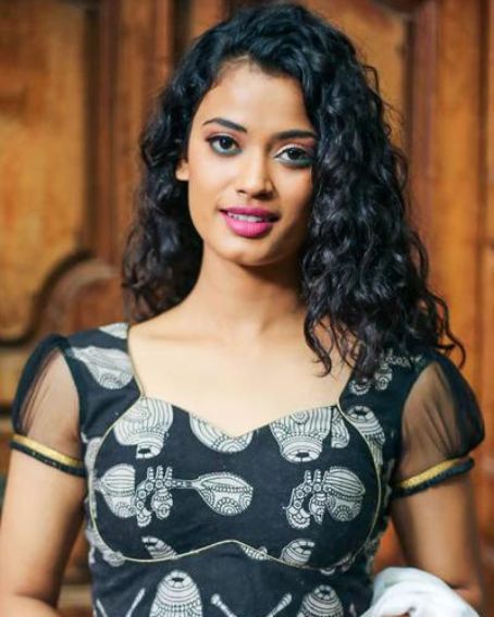Black kalamkari sweet heart neck blouse with net puff sleeves