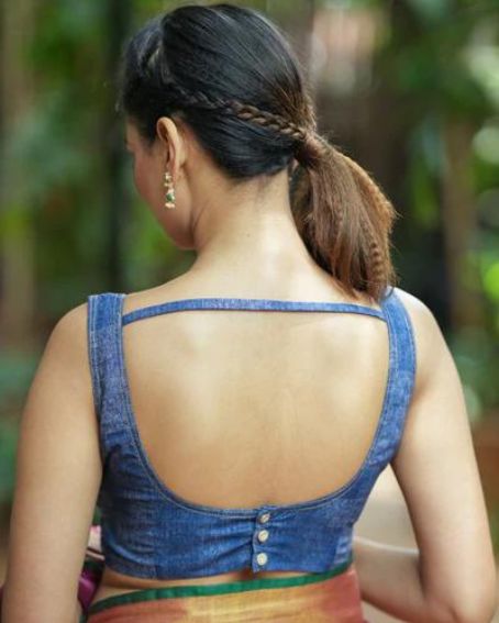 Blue denim sweetheart neck sleeveless blouse with button detailing