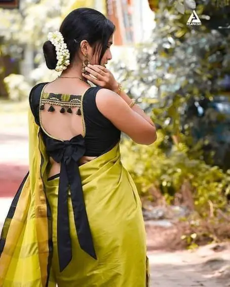 Bow Design Part Blouse Black Color With Parrot Combination Saree