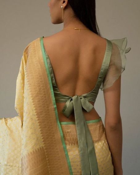 Bow Designer Blouse With Soft Green Color for Cream Colored Saree