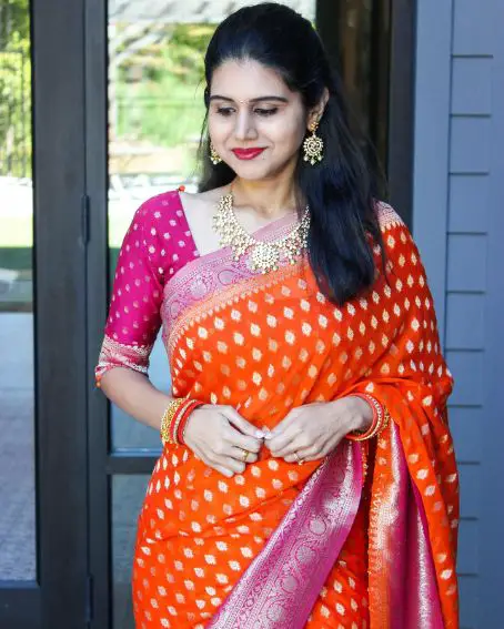 Fancy Orange Georgette Saree with Pink Blouse