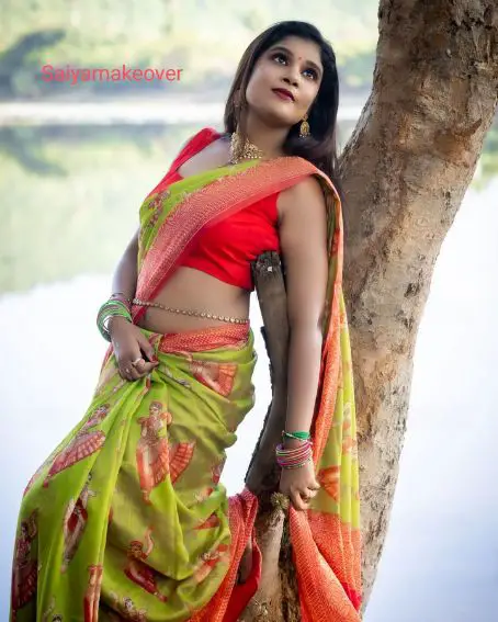 Fluorescent Green Color Saree with Red Sleeveless Blouse