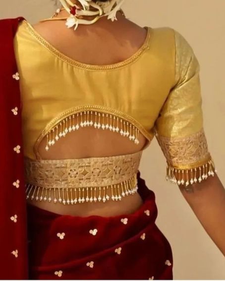 Gold Amazing Backless Blouse Design with Tassels