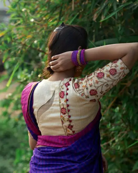 Golden Blouse With Potli Designs With Blue Saree