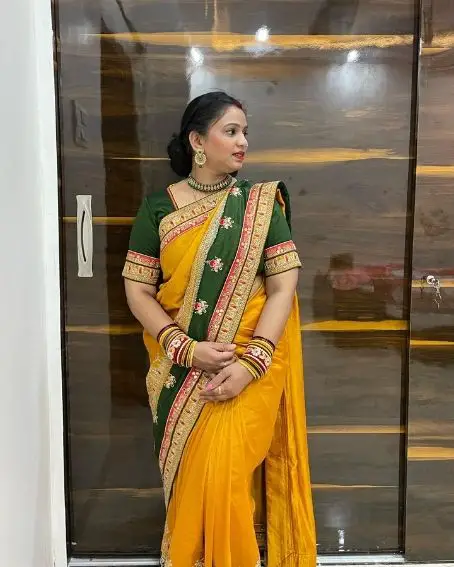 Green Color Embroidery Blouse Design with Yellow Saree
