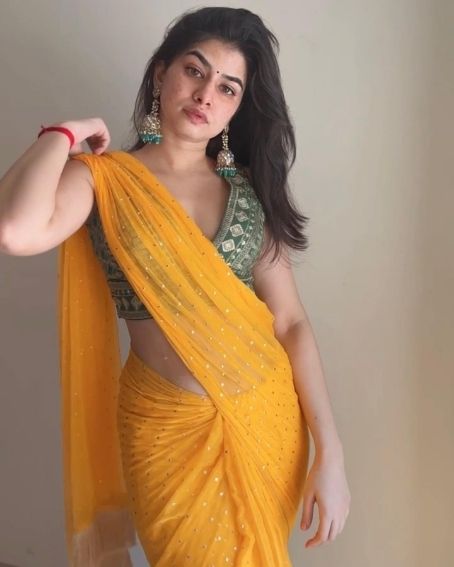 Green Color Sleeveless Embroidery Blouse Design with Yellow Saree