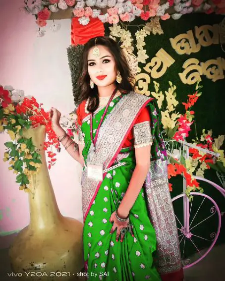 Green Fancy Saree with Red Blouse