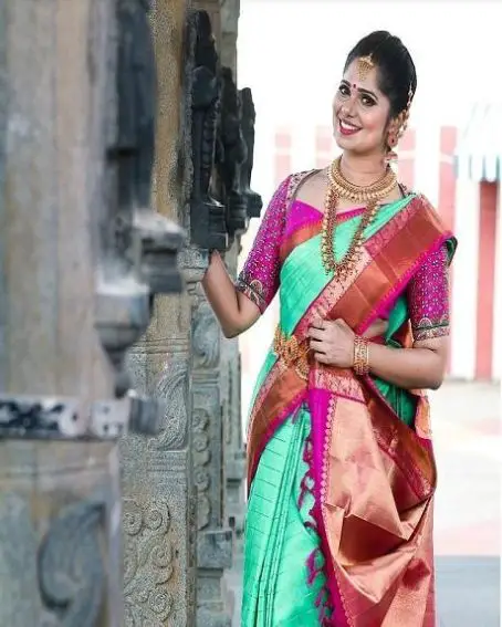 Green Pattu Saree with Pink Blouse