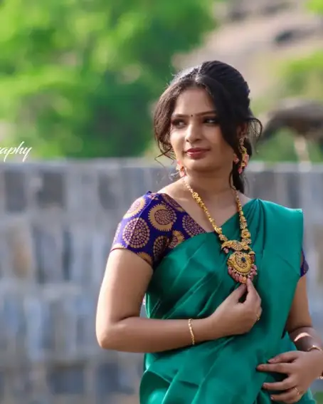 Green Plain Saree with Blue Benarasi Blouse