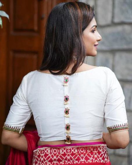 Ivory Pure Silk Blouse with Kemp work on boat neck and Jadau back buttons