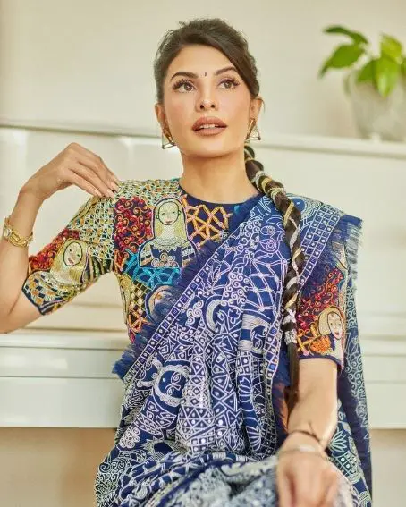 Jacqueline Fernandez in Blue Saree with Multicolor Dolls Designer Blouse