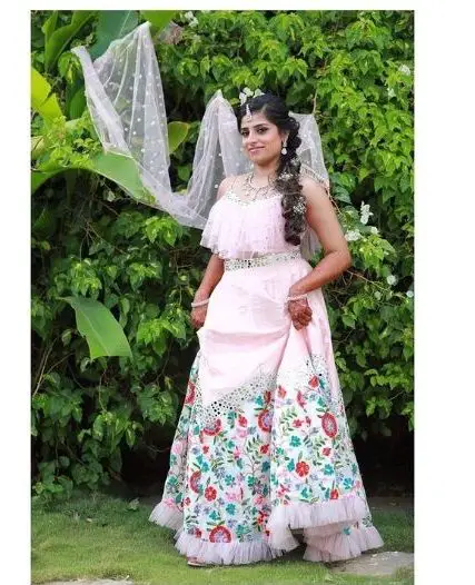 Light  Pink Color Lehanga with Sleeveless Prills Blouse Design