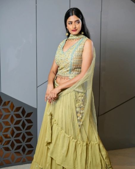 Olive Green Lehenga with Sleeveless Blouse