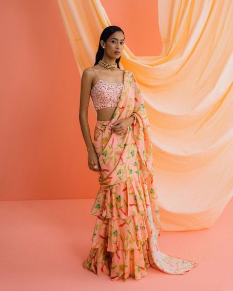 Peach Ruffle Pre-Stitched Saree With An Embroidered Noodle Strap Blouse