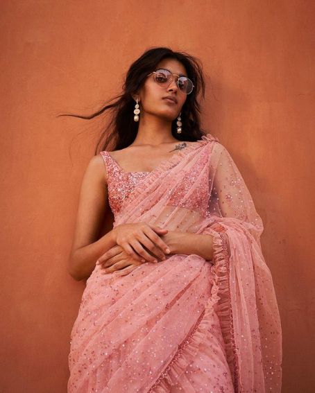 Peach Ruffle Saree with Stone Work and Sequins Blouse