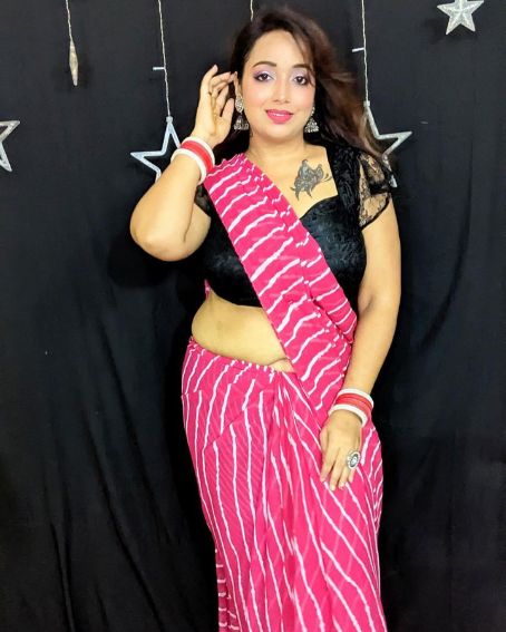 Pink Stripes Saree with Black Net Style Blouse