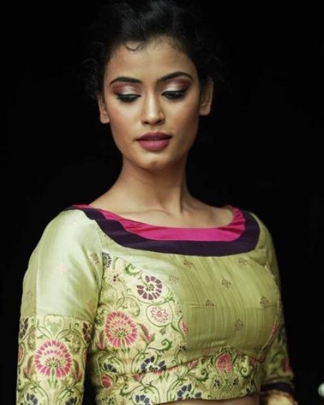 Pista green round neck banarasi brocade blouse with back detailing