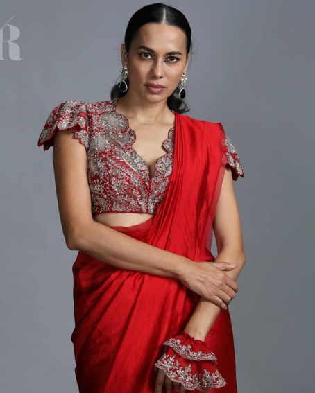 Plain Saree Paired with an Embroidered Blouse