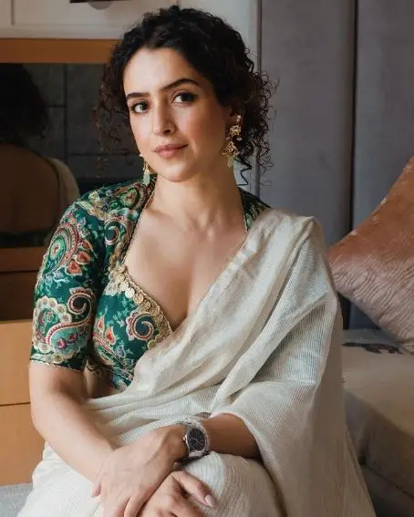 Sanya Malhotra in V Shaped Green Color Work Blouse with Beige Saree