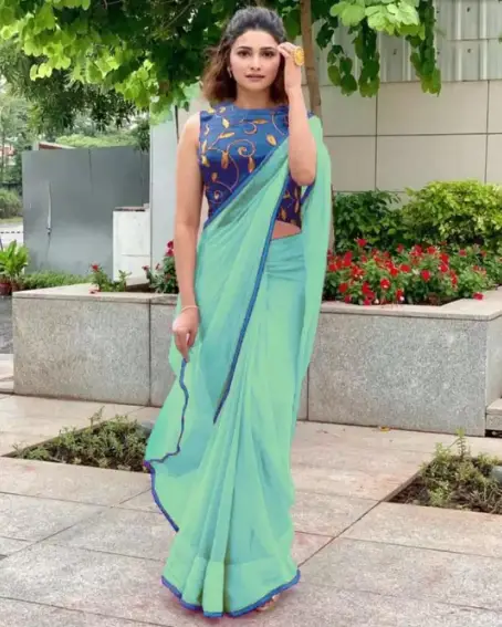 Self Design Bollywood Green Chiffon Saree with Blue Designer Blouse