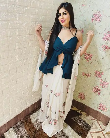 Stylish Blue Color Peplum Designer Blouse With White Skirt