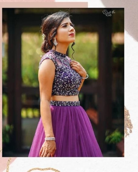 Violet Color Lehenga with Purple Color Sleeveless Blouse