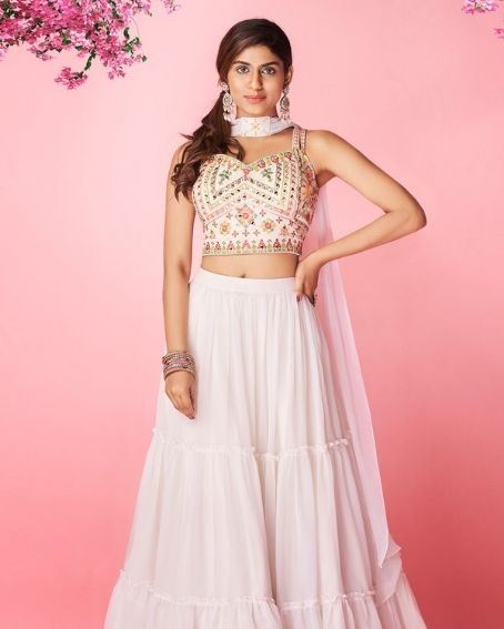 White Georgette Frilled Lehenga Choli with Sleeveless Blouse