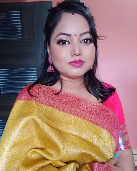 Yellow Benarasi Saree with Pink Blouse