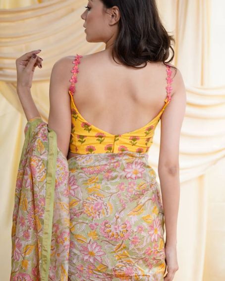 Yellow Color Floral U Shaped Blouse Design