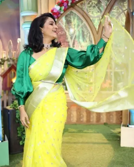 Yellow Color Saree with Green Balloon Sleeve Blouse Design